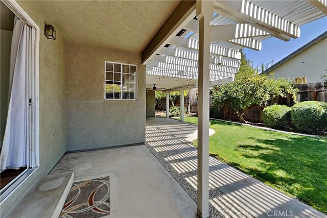 2100 Sherwood Ave Unit A, Modesto, CA 95350 - view of patio featuring a pergola and fence
