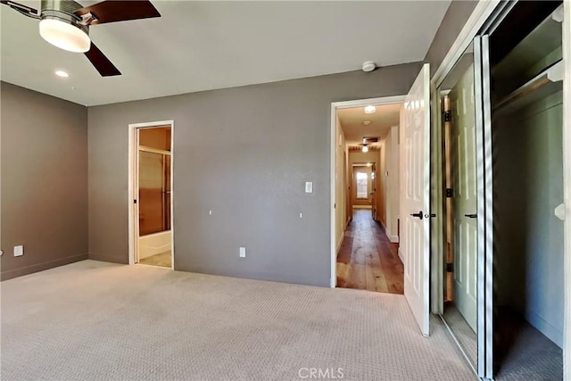 2100 Sherwood Ave Unit A, Modesto, CA 95350 - unfurnished bedroom featuring a ceiling fan, light carpet, and a closet