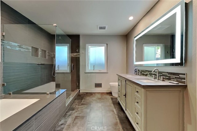 2100 Sherwood Ave Unit A, Modesto, CA 95350 - bathroom featuring a shower stall, a sink, visible vents, and double vanity