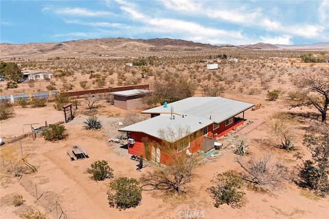 bird's eye view featuring a rural view, a mountain view, and view of desert