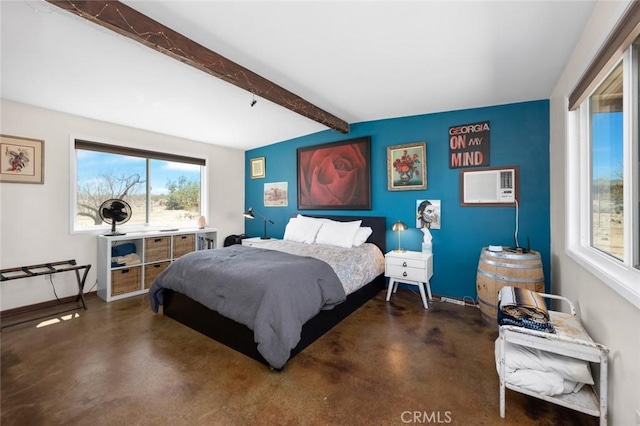 bedroom featuring beamed ceiling, baseboards, a wall mounted AC, and finished concrete flooring