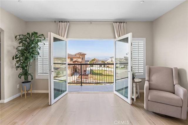 13083 Via Tuscany, Riverside, CA 92503 - sitting room featuring wood finished floors and baseboards