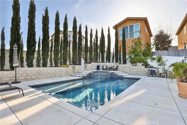 13083 Via Tuscany, Riverside, CA 92503 - view of pool with a fenced backyard, a patio, and a pool with connected hot tub