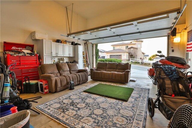 13083 Via Tuscany, Riverside, CA 92503 - garage featuring a wall unit AC