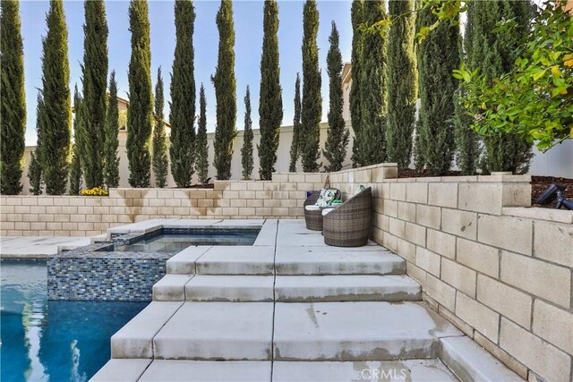 13083 Via Tuscany, Riverside, CA 92503 - view of pool featuring an in-ground hot tub
