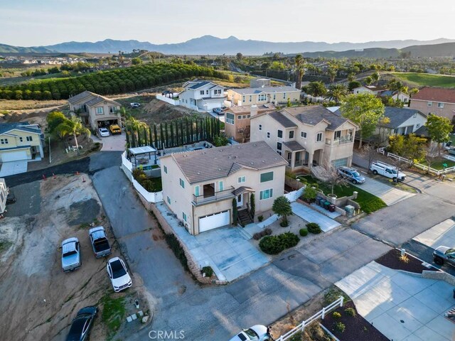 13083 Via Tuscany, Riverside, CA 92503 - aerial view of residential area with a mountainous background