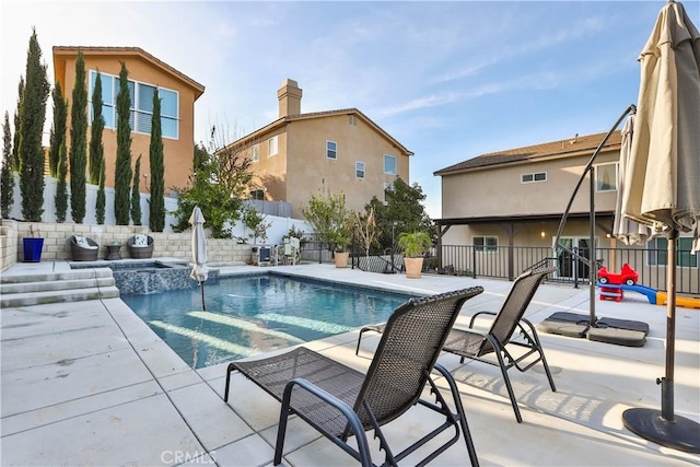 13083 Via Tuscany, Riverside, CA 92503 - view of pool with a fenced backyard, a patio area, and a pool with connected hot tub