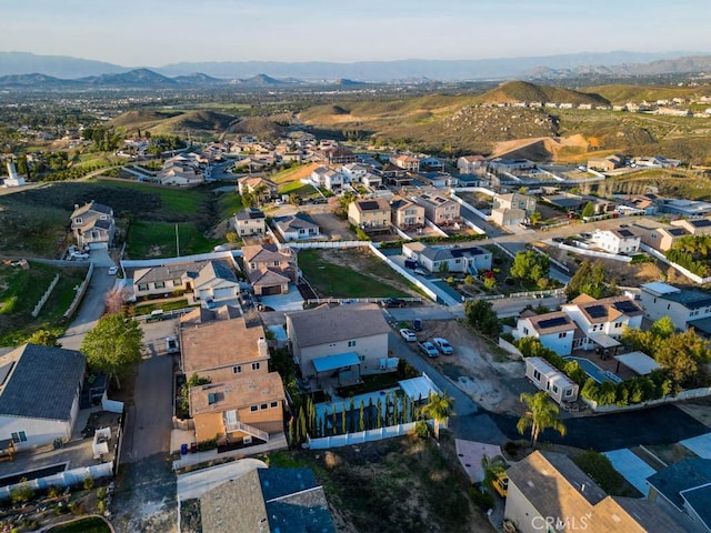 13083 Via Tuscany, Riverside, CA 92503 - aerial view of property and surrounding area featuring nearby suburban area and mountains