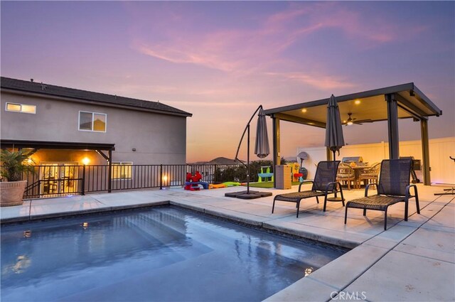 13083 Via Tuscany, Riverside, CA 92503 - view of swimming pool with a patio