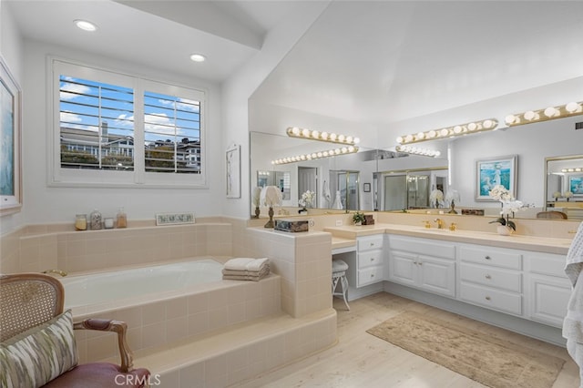 25382 Village Rd, Dana Point, CA 92629 - bathroom featuring a shower stall, vanity, a garden tub, wood finished floors, and recessed lighting
