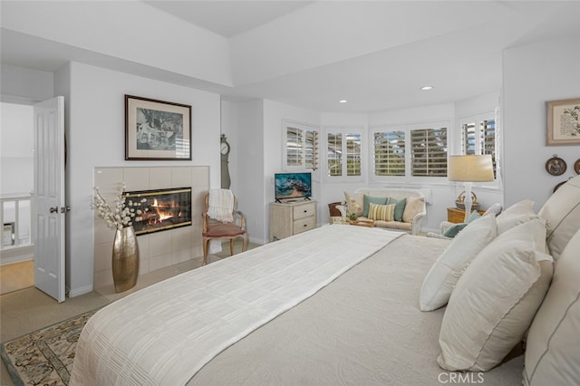 25382 Village Rd, Dana Point, CA 92629 - bedroom with a tile fireplace, recessed lighting, carpet flooring, and baseboards