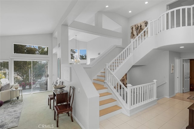 25382 Village Rd, Dana Point, CA 92629 - stairs with high vaulted ceiling, recessed lighting, baseboards, and tile patterned flooring