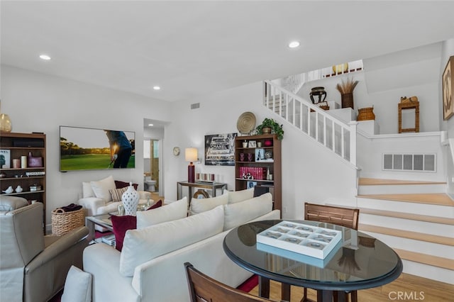 25382 Village Rd, Dana Point, CA 92629 - living area featuring stairway, recessed lighting, and wood finished floors