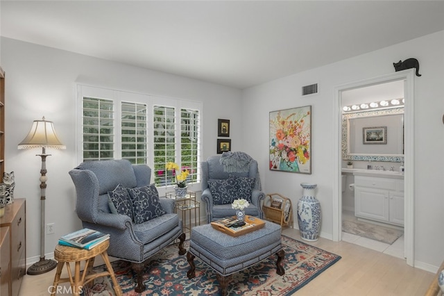 25382 Village Rd, Dana Point, CA 92629 - sitting room featuring light wood-style floors and baseboards