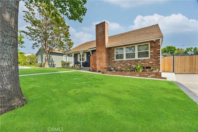 11330 Whitley St, Whittier, CA 90601 - single story home featuring a chimney, brick siding, and roof with shingles