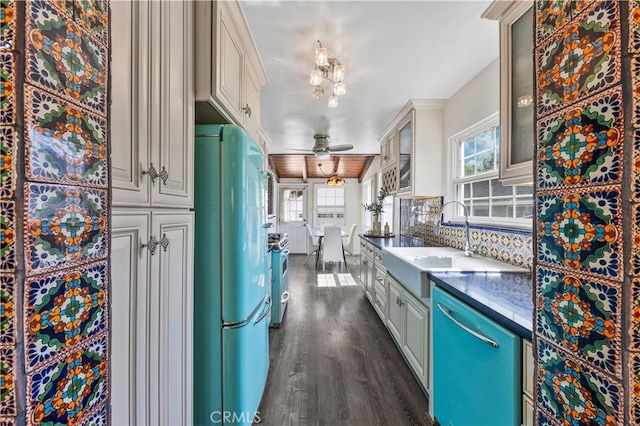 11330 Whitley St, Whittier, CA 90601 - kitchen with fridge, dishwasher, dark wood-type flooring, and plenty of natural light