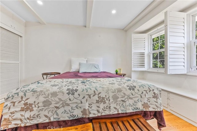 11330 Whitley St, Whittier, CA 90601 - bedroom featuring light wood-style flooring, beam ceiling, recessed lighting, and a closet