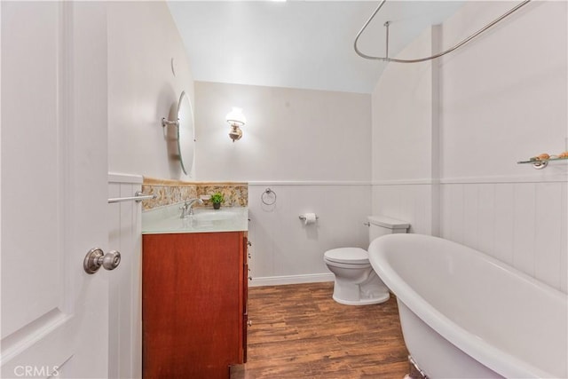 11330 Whitley St, Whittier, CA 90601 - full bath featuring a freestanding tub, a wainscoted wall, wood finished floors, and vanity