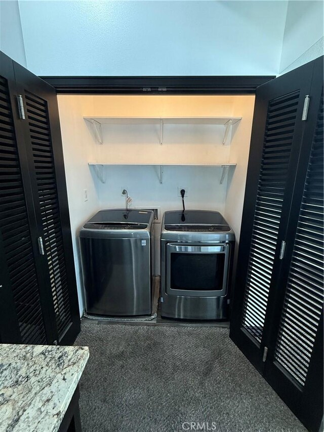 388 E Ocean Blvd Unit 212, Long Beach, CA 90802 - laundry room with washer and clothes dryer, indoor wet bar, and laundry area