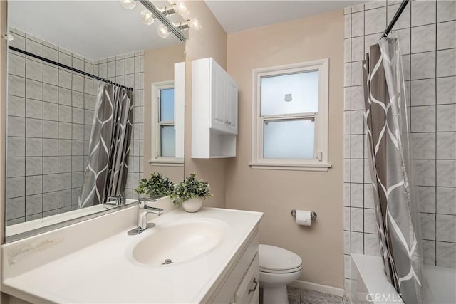 full bathroom with baseboards, shower / bathtub combination with curtain, toilet, and vanity