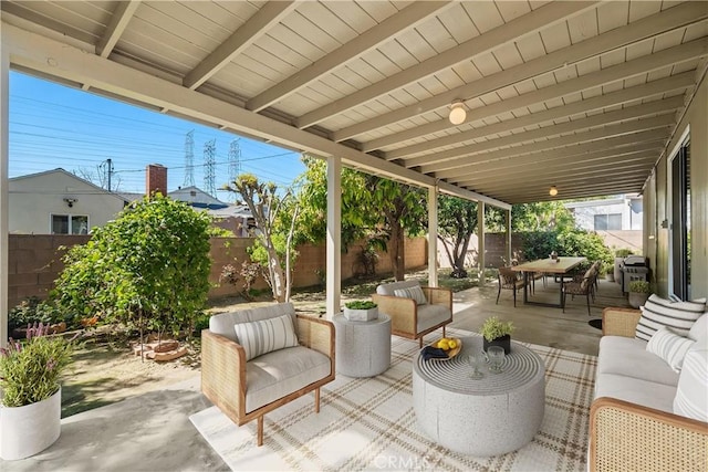 view of patio / terrace featuring an outdoor hangout area, outdoor dining area, and a fenced backyard