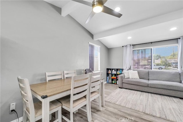 dining room with lofted ceiling with beams, light wood finished floors, baseboards, recessed lighting, and a ceiling fan