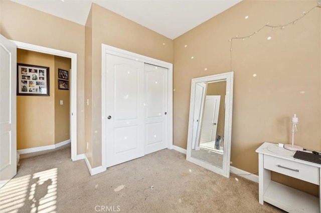 1100 N Ferrocarril Rd, Atascadero, CA 93422 - unfurnished bedroom featuring light carpet, baseboards, and a closet