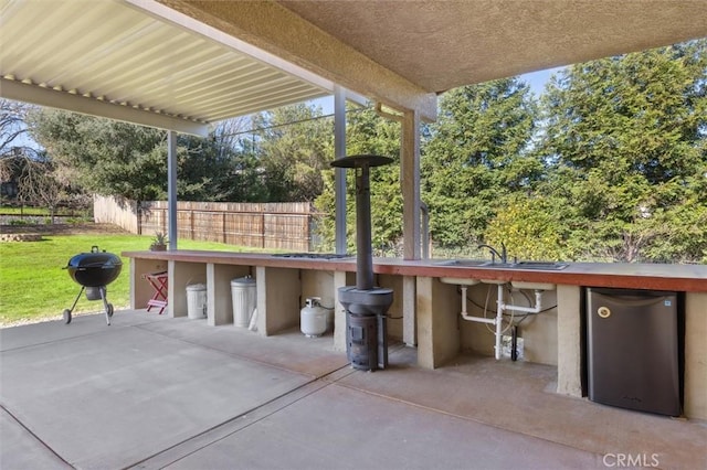 1100 N Ferrocarril Rd, Atascadero, CA 93422 - view of patio with a grill and view of wooded area
