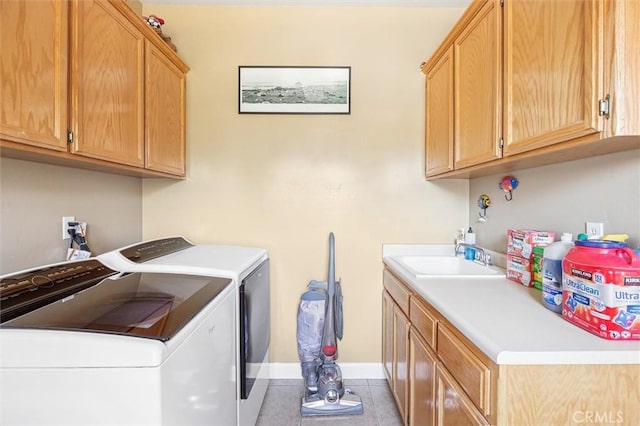 1100 N Ferrocarril Rd, Atascadero, CA 93422 - clothes washing area featuring washing machine and clothes dryer, cabinet space, and baseboards