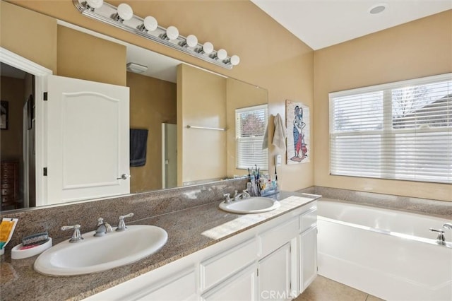 1100 N Ferrocarril Rd, Atascadero, CA 93422 - bathroom with a garden tub, double vanity, and tile patterned flooring