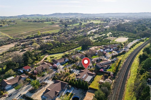 1100 N Ferrocarril Rd, Atascadero, CA 93422 - aerial overview of property's location with a mountain backdrop and nearby suburban area