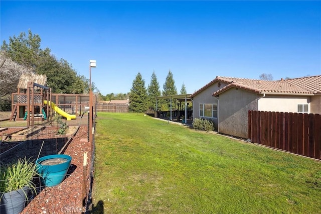 1100 N Ferrocarril Rd, Atascadero, CA 93422 - view of yard featuring a playground and a vegetable garden