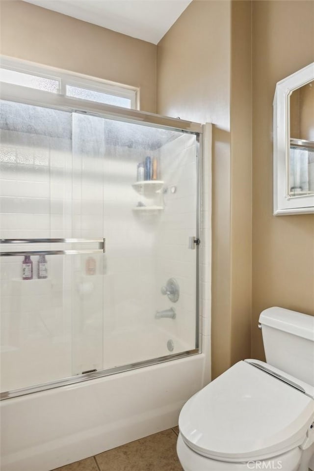 1100 N Ferrocarril Rd, Atascadero, CA 93422 - full bathroom featuring toilet, enclosed tub / shower combo, and tile patterned flooring