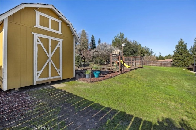 1100 N Ferrocarril Rd, Atascadero, CA 93422 - view of shed featuring a playground and a vegetable garden