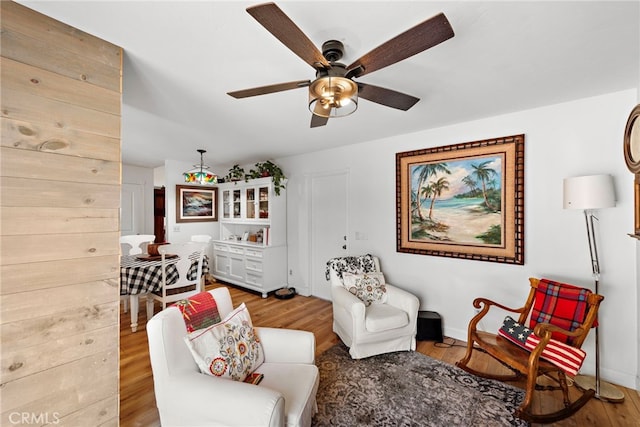 31351 Calle Del Campo, San Juan Capistrano, CA 92675 - living area featuring ceiling fan, light wood-style floors, and baseboards