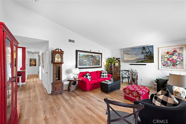 31351 Calle Del Campo, San Juan Capistrano, CA 92675 - living area with light wood-type flooring, high vaulted ceiling, and baseboards