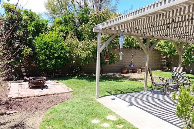 31351 Calle Del Campo, San Juan Capistrano, CA 92675 - view of grassy yard with a fire pit, a patio area, and a pergola