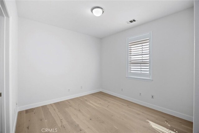 68 Sanctuary, Irvine, CA 92620 - empty room featuring baseboards and light wood-style floors