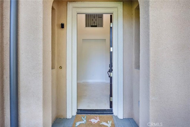 68 Sanctuary, Irvine, CA 92620 - property entrance featuring stucco siding