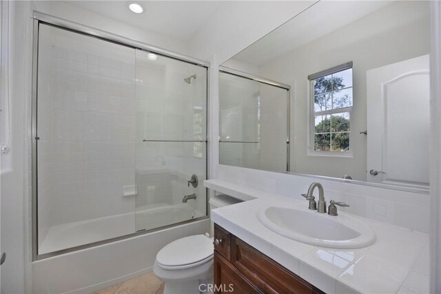 68 Sanctuary, Irvine, CA 92620 - full bath featuring vanity, toilet, shower / bath combination with glass door, and tile patterned floors