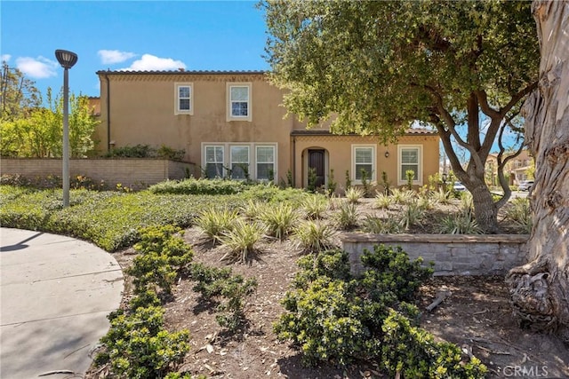 68 Sanctuary, Irvine, CA 92620 - mediterranean / spanish-style home featuring stucco siding