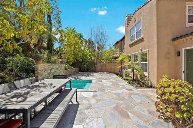 68 Sanctuary, Irvine, CA 92620 - fenced backyard with a patio area and outdoor dining area
