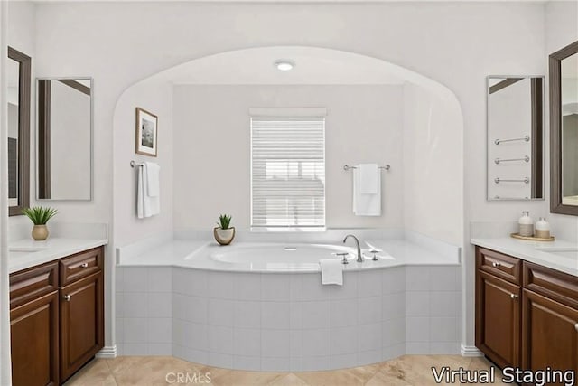 68 Sanctuary, Irvine, CA 92620 - bathroom with two vanities, a garden tub, and tile patterned floors