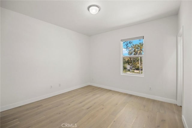 68 Sanctuary, Irvine, CA 92620 - empty room featuring baseboards and light wood-style floors