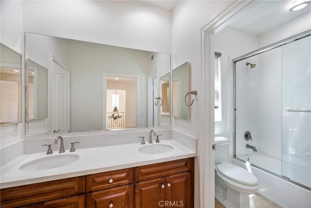 68 Sanctuary, Irvine, CA 92620 - full bathroom with double vanity, enclosed tub / shower combo, and toilet