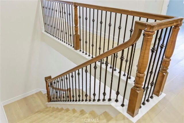 68 Sanctuary, Irvine, CA 92620 - stairs with baseboards and wood finished floors