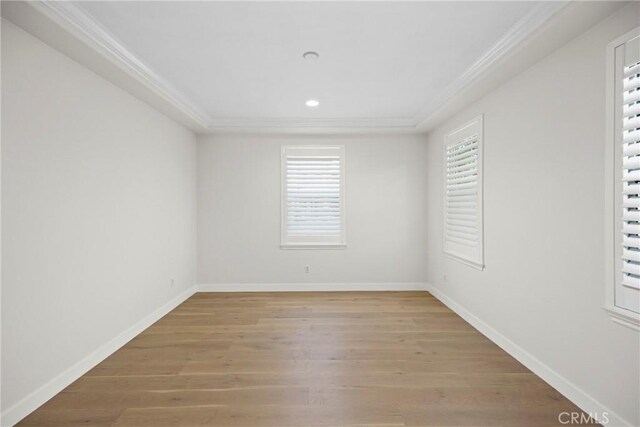 68 Sanctuary, Irvine, CA 92620 - empty room featuring ornamental molding, light wood finished floors, recessed lighting, and baseboards