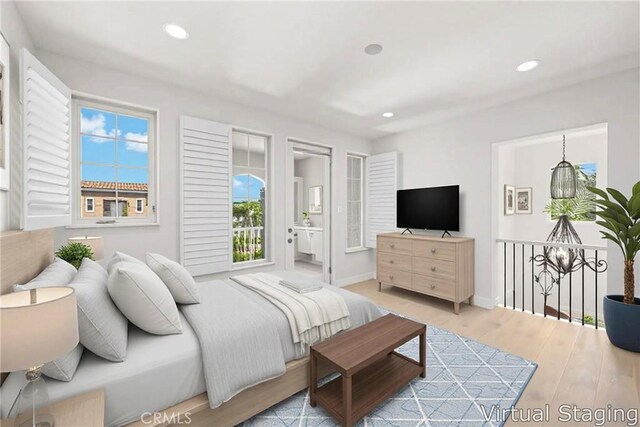 68 Sanctuary, Irvine, CA 92620 - bedroom featuring multiple windows, recessed lighting, baseboards, and wood finished floors
