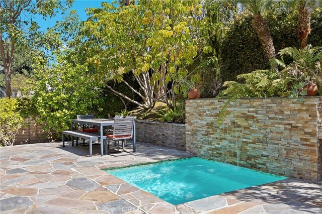 68 Sanctuary, Irvine, CA 92620 - view of pool featuring a patio area and outdoor dining area