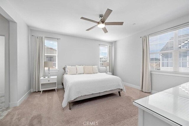 160 Earthwood Ln, San Luis Obispo, CA 93401 - bedroom with baseboards, ceiling fan, and light carpet